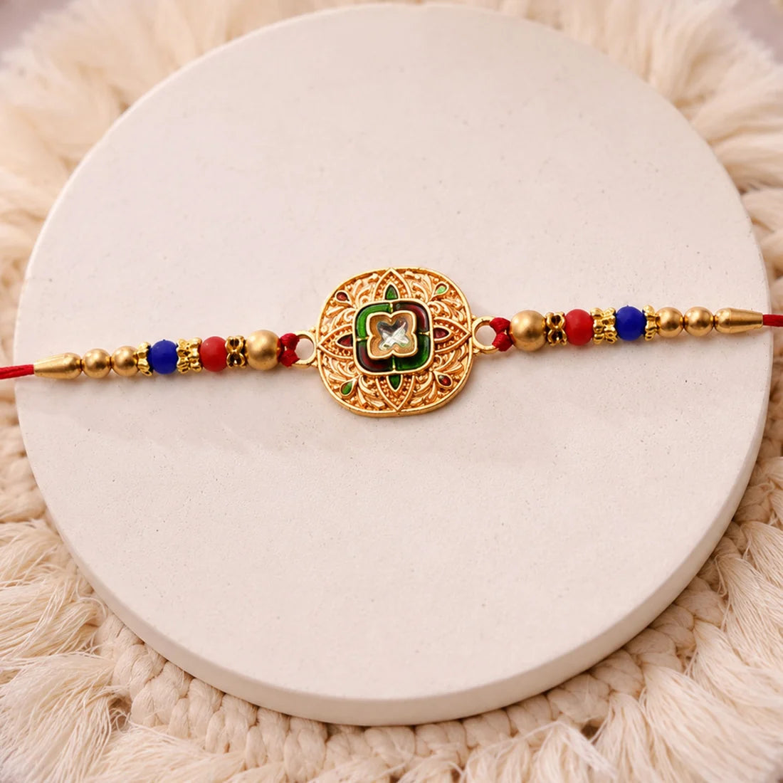 Traditional Kundan Rakhi With Antique Gold Finish Multicolor Beads