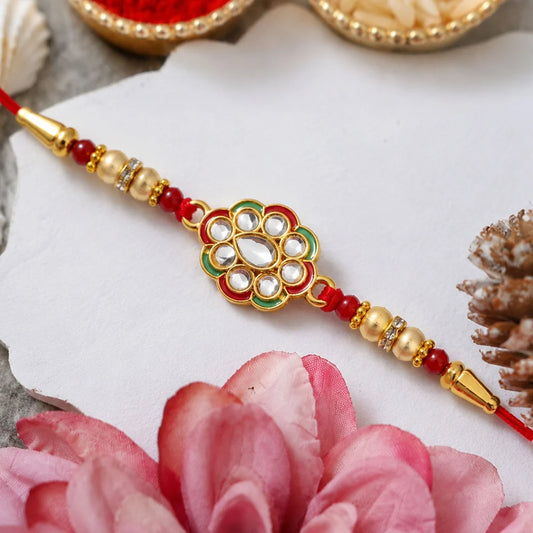Kundan Work Floral Rakhi With Red Thread