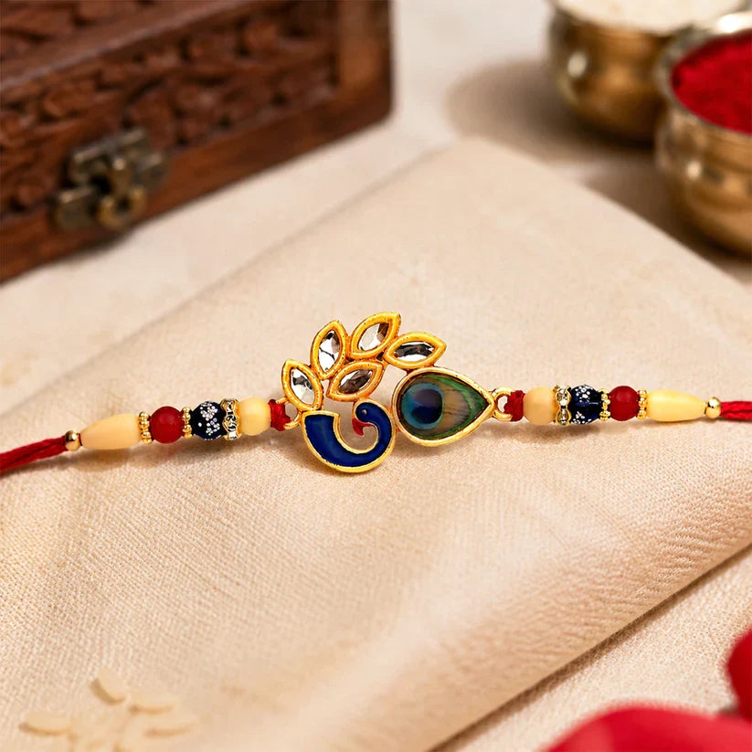 Artistic Mor Pankh Rakhi With Colorful Enamel And Traditional Thread