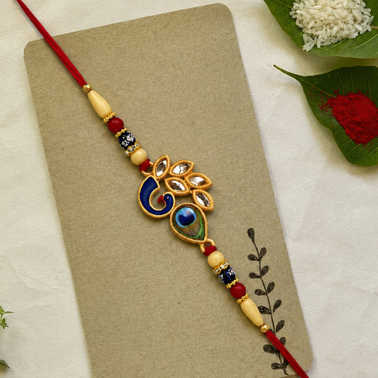 Artistic Mor Pankh Rakhi With Colorful Enamel And Traditional Thread